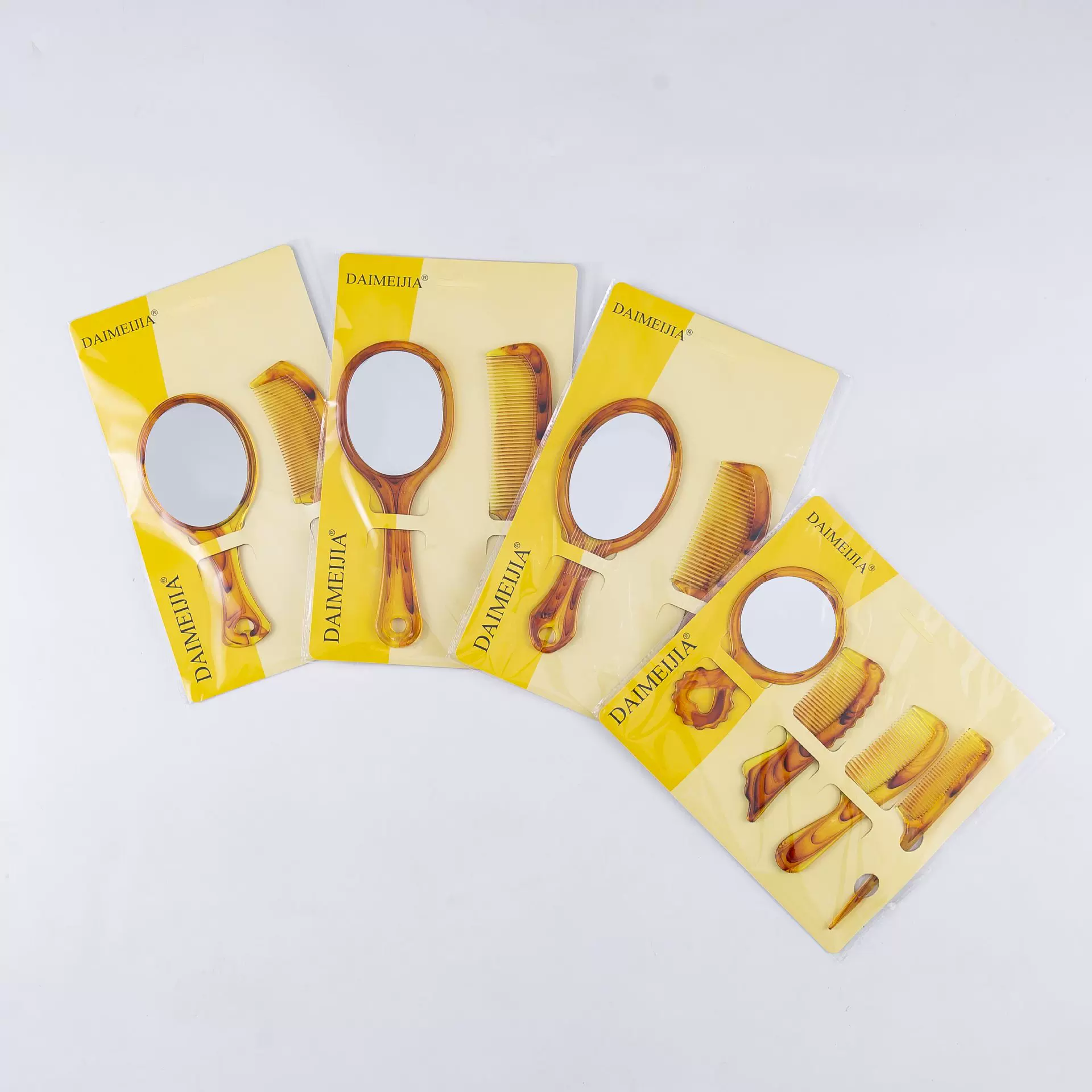 梳子镜子组合四件套塑料镜子梳子2元5元店批发产品地摊日用品货源