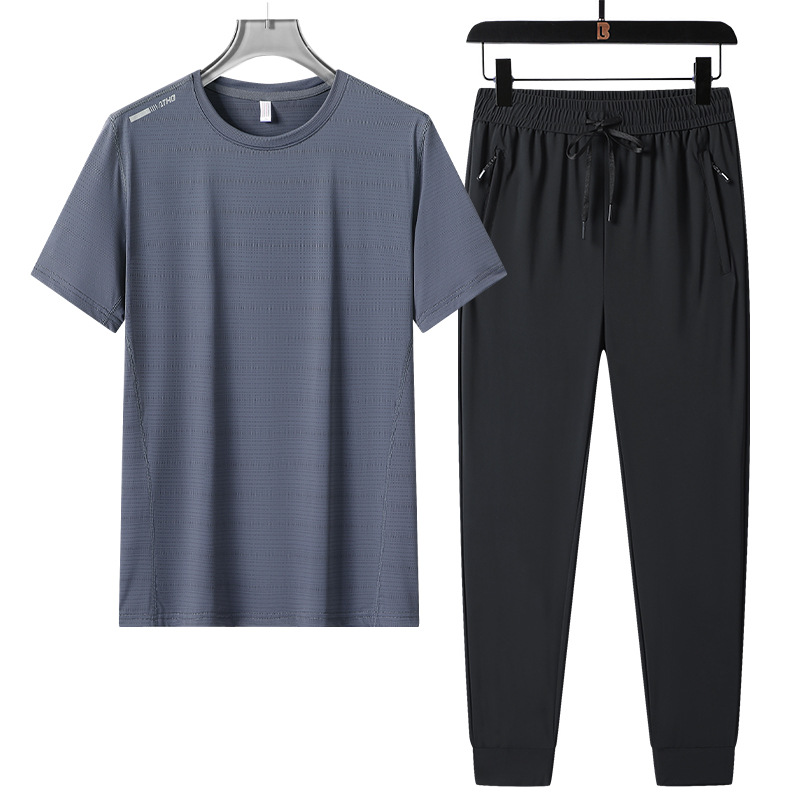 Hombre de verano helado juego deportivo casual transpirable rápido seco cuello redondo manga corta suelta pantalones largos de dos piezas al por mayor