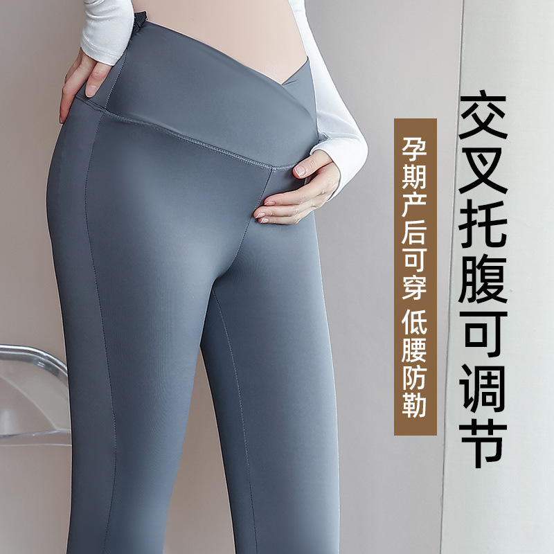 Slightly flared maternity shark pants, breathable for outdoor wear, slimming design with a cross-back hemline that drapes elegantly to the floor—perfectly tailored for a sleek, figure-flattering look in both casual and workout settings.