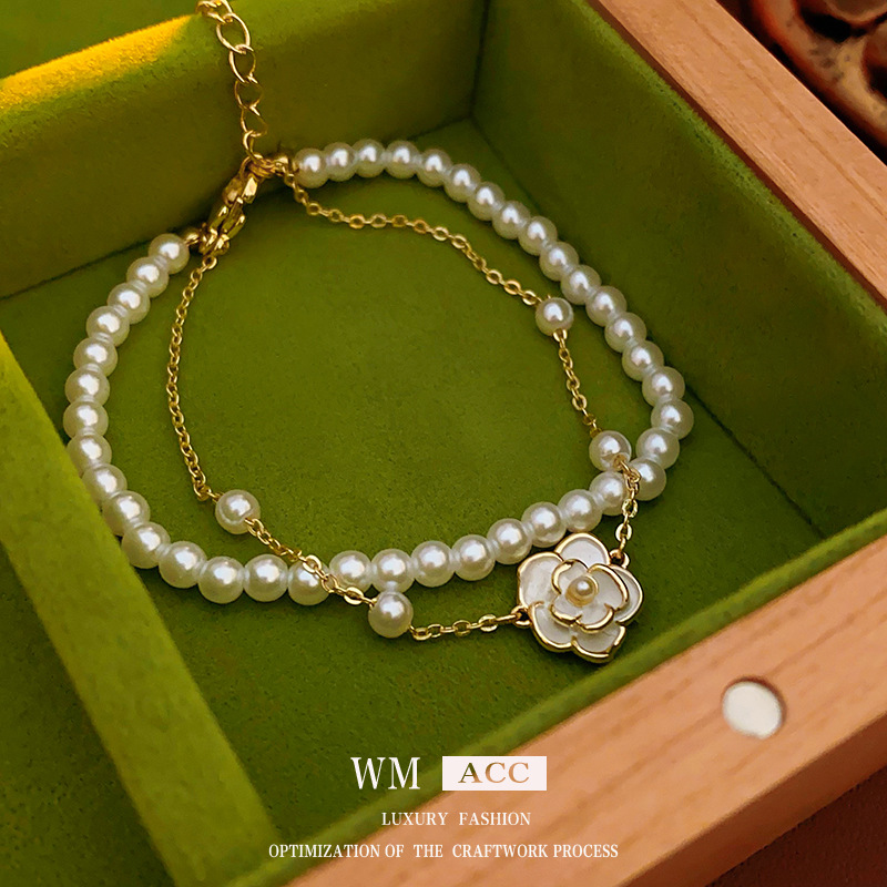 Oro real galvanoplastia gota aceite Camelia perla pulsera elegante luz de lujo de alto grado pendientes de fábrica al por mayor
