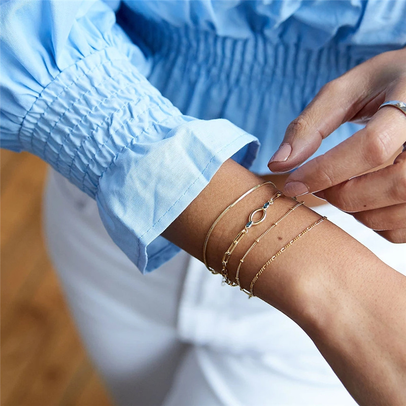 Moda europea y americana INS cruz de superposición creativa cadena de serpiente plana pulsera de todo fósforo traje de todo fósforo de moda