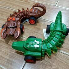 儿童机械鳄鱼战骨车塑胶男孩电动益智灯光音乐爬行扭动前进玩具车