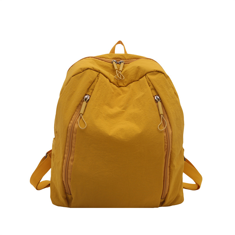 Mochila de clase universitaria casual nicho de diseño de color sólido 2025 nueva gran capacidad de viaje de viaje de viaje de la moda