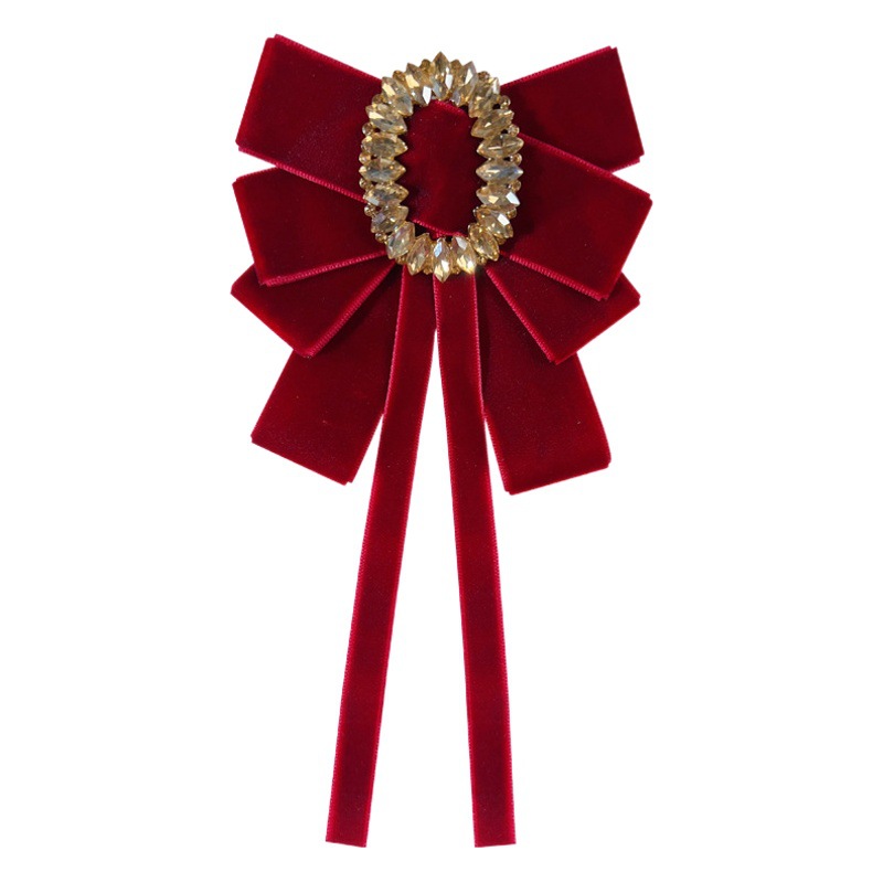 Joyería transfronteriza Otoño e Invierno estilo Chanel Estilo Vintage terciopelo negro arco de alto grado de oro pajarita broche femenino venta al por mayor