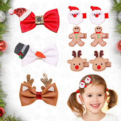子供のクリスマスの姜パイ人のヘアピン欧米のクリスマスの皮質の蝶結びの縁にサンタクロースのヘラジカの頭飾りを挟みます。