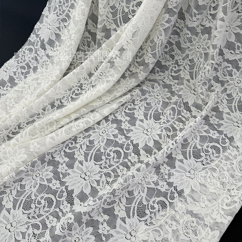 2026 nuevo estilo de diseño de moda tela de encaje elástica vestidos de mujer fábrica de falda en stock