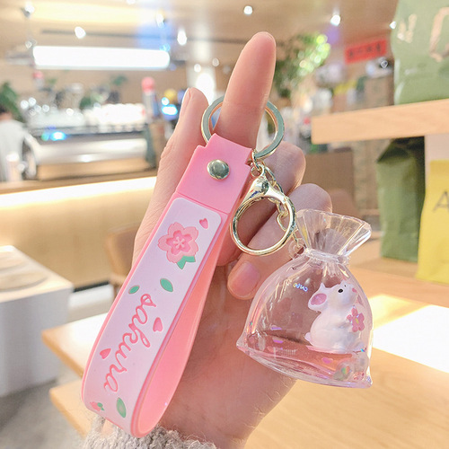 New cartoon oiled little rabbit keychain pendant cute personalized creative jade rabbit quicksand bottle women's bag pendant