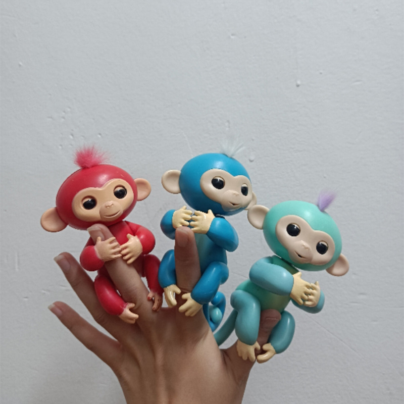 El comercio exterior de juguete dedo mono táctil interactivo muñeca dedo mono inducción cumpleaños regalo inteligente juguete los niños