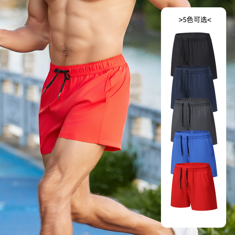 Pantalones cortos deportivos para correr anti-exposición de los hombres falsos de dos piezas de entrenamiento suelto al aire libre pantalones de fitness delgados pantalones cortos de secado rápido