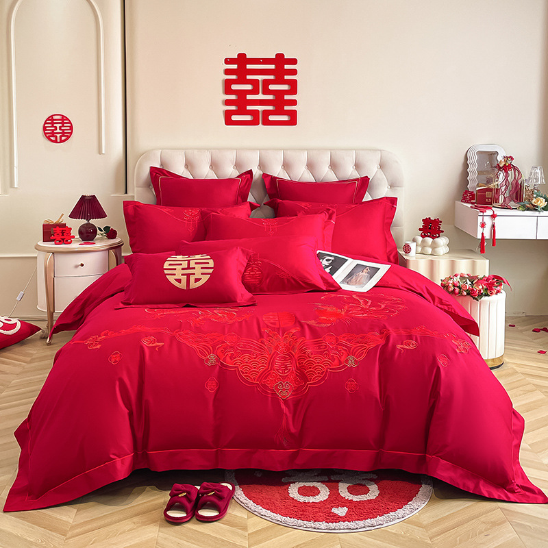 Una clase de madres y bebés de algodón de boda cuatro piezas grandes sábanas bordadas rojas chinas cubierta de cama de boda