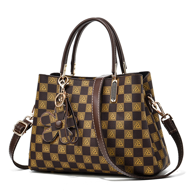 Bolsos de mujer de gran capacidad 2025 para viajeros de alta gama Bolsos grandes portátiles de moda presbiteriana Bolsos de mensajero de un solo hombro al por mayor