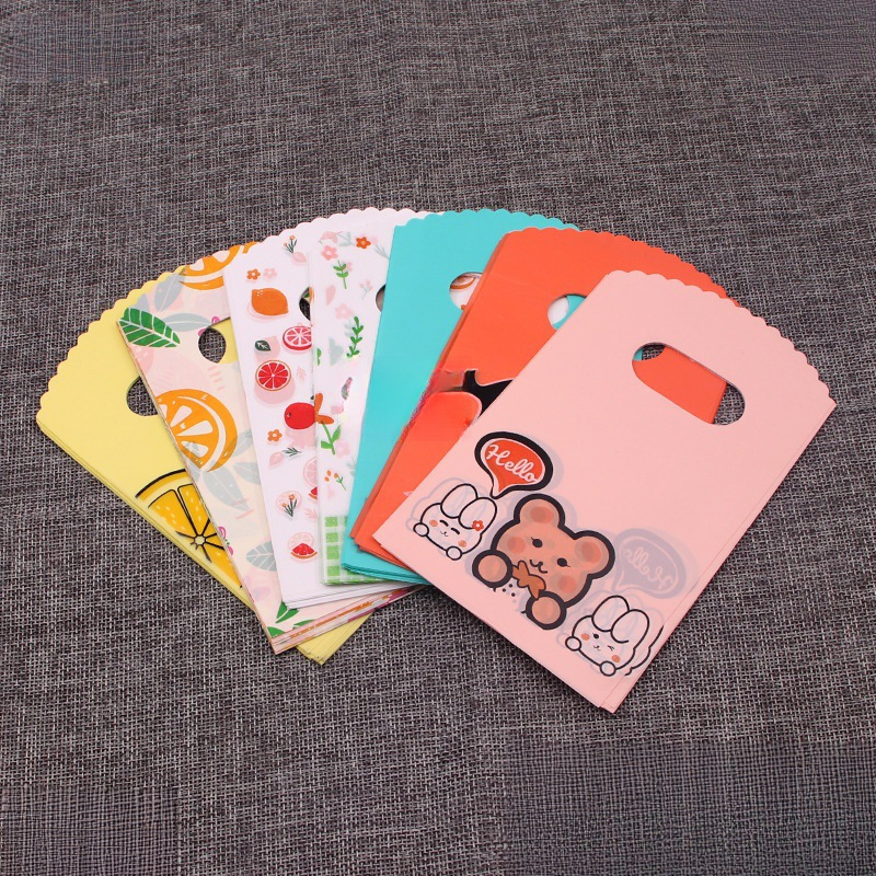 50个迷你小号塑料袋店饰品小商品打包袋摆摊购物礼品袋手提袋包邮