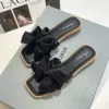 With bow, black