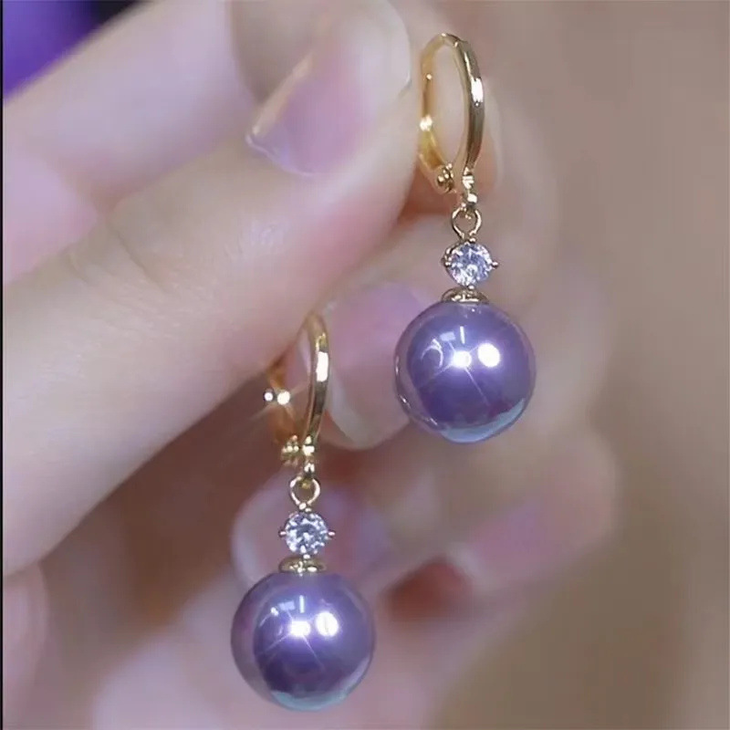 Retro estilo de Hong Kong ópalo redondo s925 con pendientes de plata, pendientes de temperamento simple de lujo ligero femenino, orejas de sentido avanzado de nicho