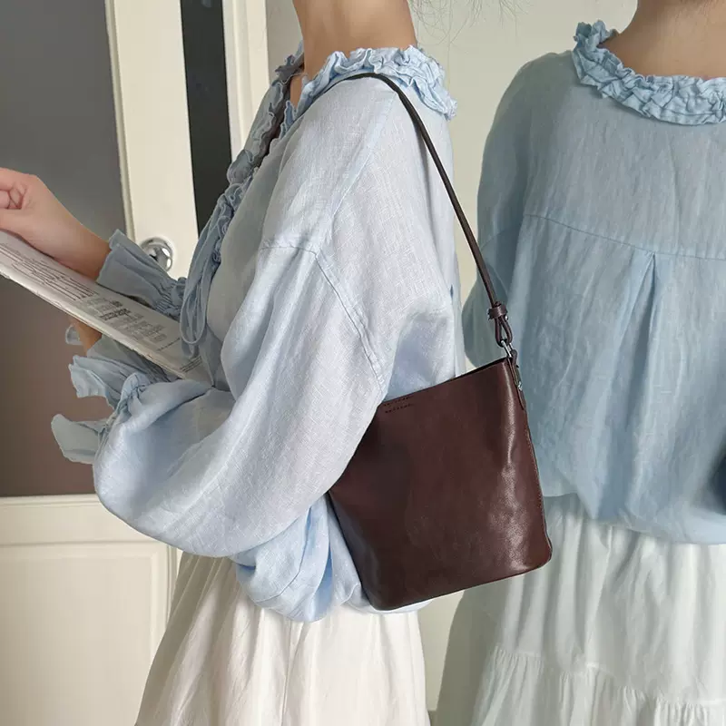 真皮水桶包女2026新款极简复古风头层植鞣牛皮女包单肩斜挎包小包