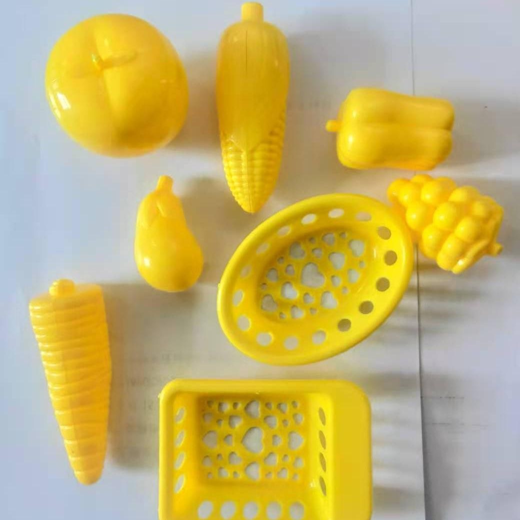 Juguetes caseros infantiles moldeado por inyección piezas de fruta viejas