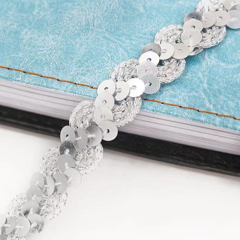 1.5CM ondulado en forma de S lentejuelas lentejuelas con cordones accesorios de ropa de cinta accesorios de ropa de rendimiento de bricolaje al por mayor