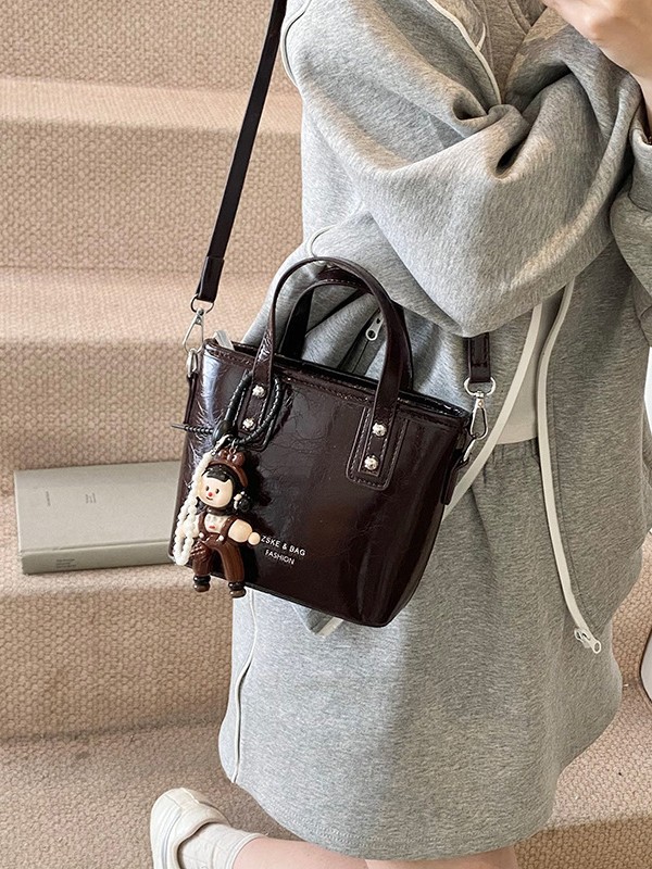 2025 nuevo nicho de moda bolso de cubo de mano para mujeres estilo coreano simple versátil bolso de hombro de moda mochila casual