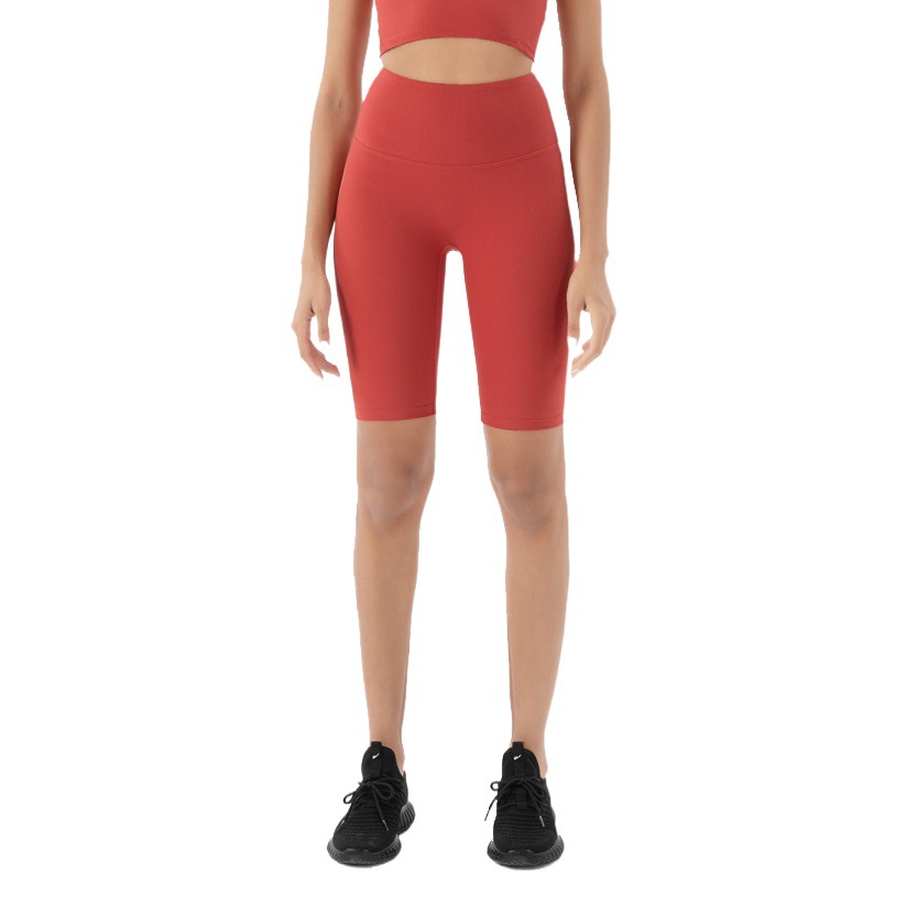 Nuevos shorts de yoga acanalados sin costuras de estilo europeo y americano para mujer, de cintura alta, efecto levanta glúteos, shorts deportivos de cinco puntos.