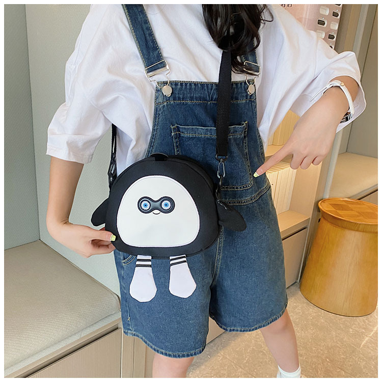 The new 2024 children's egg-shaped party backpack is a cute cartoon canvas single-shoulder bag and a fashionable and stylish small backpack undefined