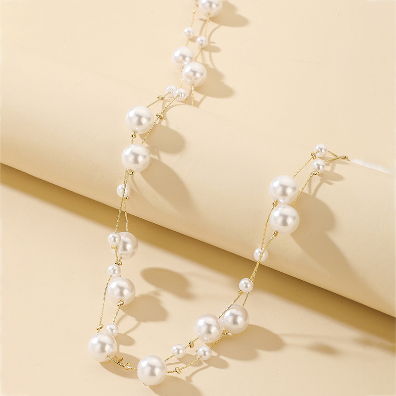 Exaggerated Long Pearl Simple Alloy Multi-layer Necklace Wholesale display picture 3