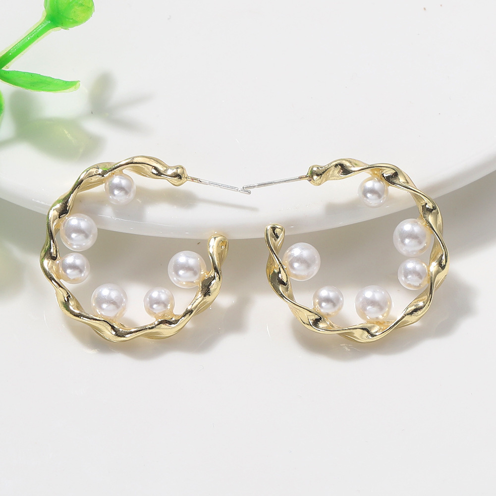 Vente En Gros Boucles D&#39;oreilles En Perles De Texture En Métal Rose Mat En Relief Simples Nihaojewelry display picture 7