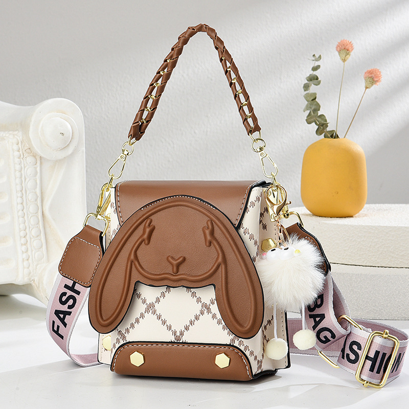 Bolsa de cubo de temperamento universal, nuevo tipo de bolso de mochila de verano 2025, bolsos de mano exquisitos, bolsos de hombro exquisitos, bolsos de mujer
