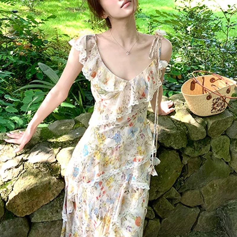 Wear Monet's Garden on your body with this colorful floral dress featuring ruffled lace splicing and a slimming floral print, long style Wear Monet's Garden on your body with this colorful floral dress featuring ruffled lace splicing and a slimming floral print, long style