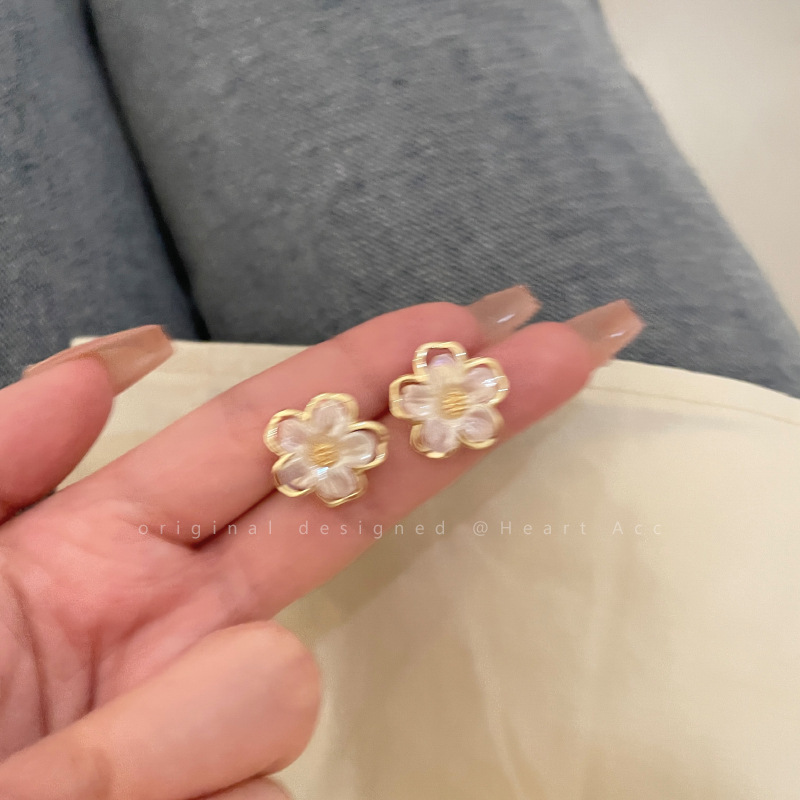 Diseño de nicho de alta gama borla larga sin orejas clip de oreja elegante estilo occidental de las mujeres cara-mirando pequeños nuevos pendientes de moda