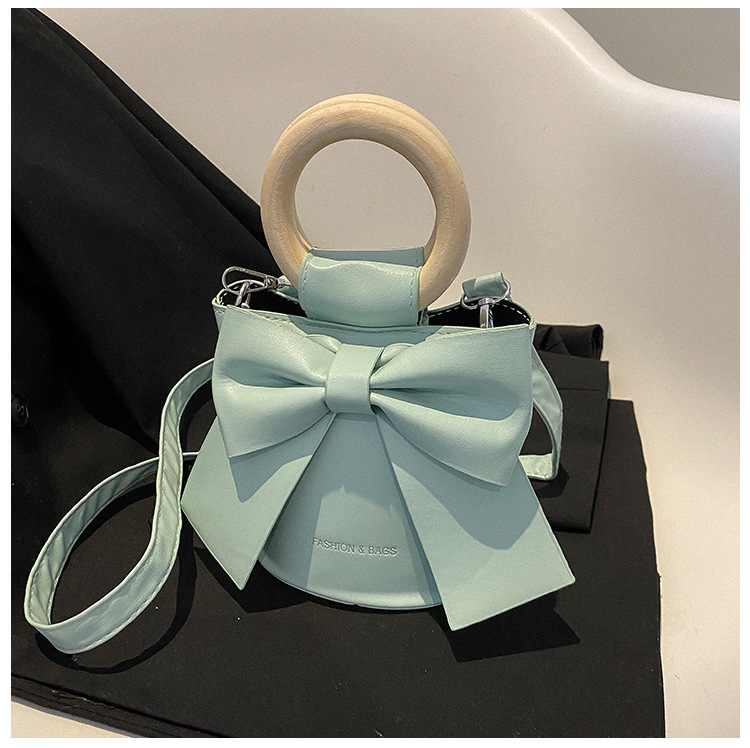 455g Weight Synthetic Leather Lining Material Sewing Thread Fashion Element Magnetic Buckle Closure Type Single Shoulder Strap, Double Handle Strap Type Bucket Bag Bags Type Casual Occasion Pu Leather Material Bow Knot Pattern All Seasons Season Women's Gender Elegant Style Bucket Shape Small Size Women's Small Pu Leather Bow Knot Elegant Sewing Thread Bucket Magnetic Buckle Bucket Bag 27