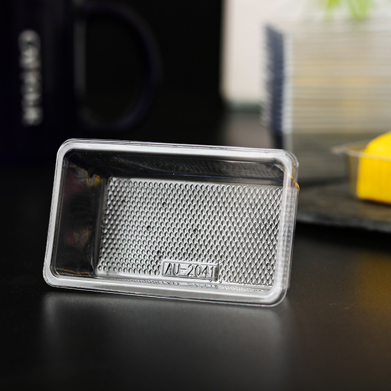 En stock al por mayor transparente simple entrega crujiente caja de soporte de plástico blister material PET engrosada postre piña crujiente soporte interior