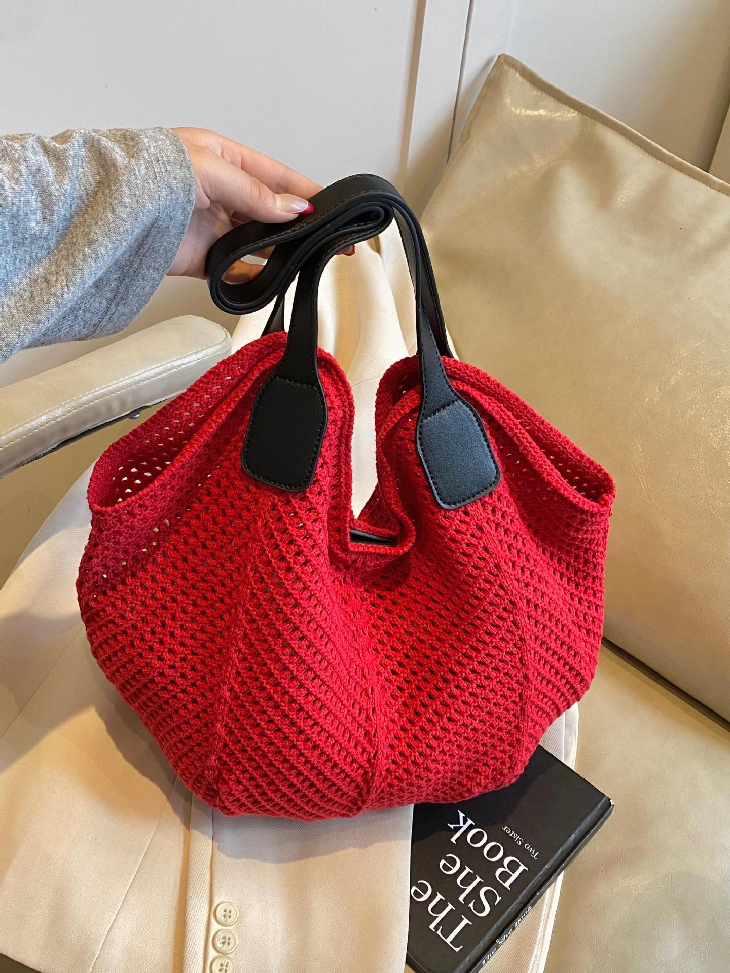Bolso Tote de gran capacidad hueco tejido femenino 2025 nuevo bolso de playa de vacaciones junto al mar bolso tejido de paja de alta gama coreano