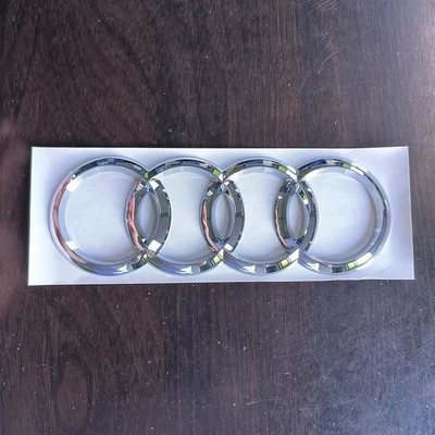 logo four-wheel drive 40 45TFSI — Car logo - standard-rear-four-ring-emblem