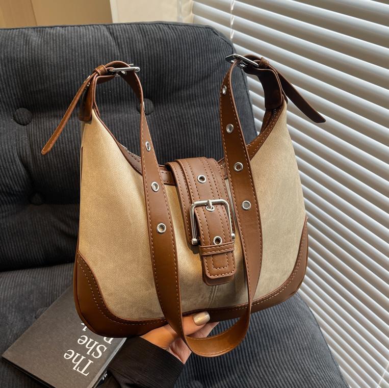 Bolso de tendencia de color contrastante para mujeres 2025, nuevo estilo versátil bolso de hombro retro estilo extranjero, alta sensación de mochila