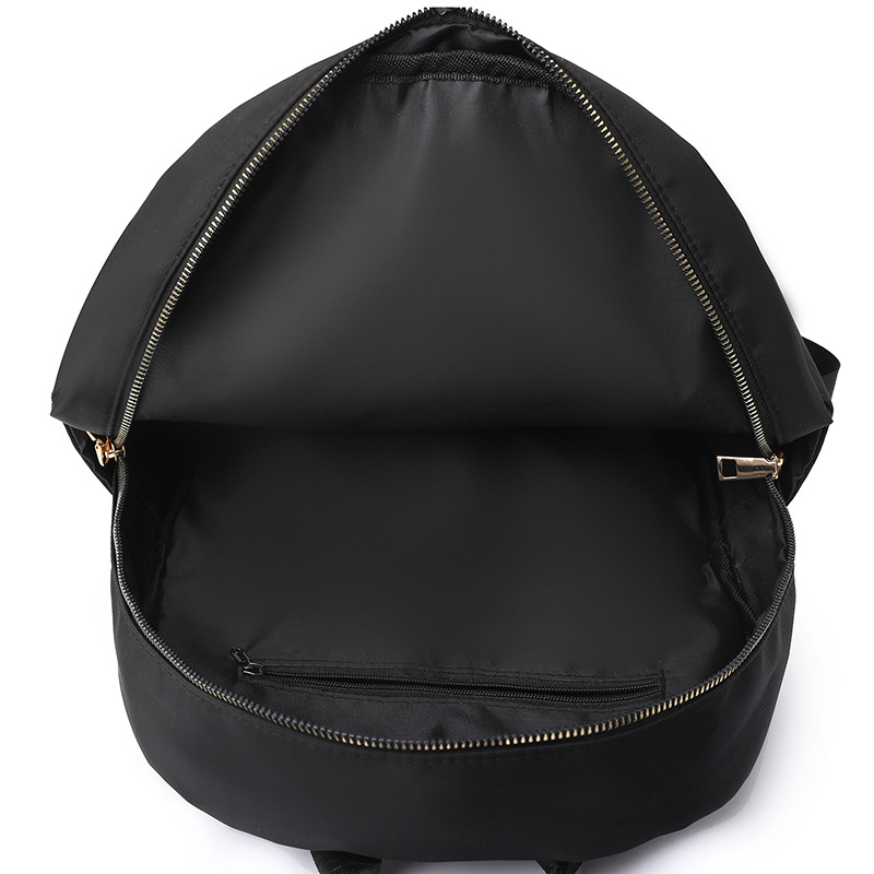 2023 verano nuevo estilo casual damas mochila de nailon simple literatura al aire libre mochila de viaje ligero mochila escolar al por mayor