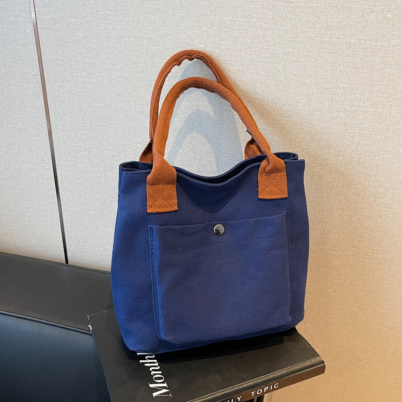 2024 nuevo bolso de lona para mujeres tela japonesa retro simple versátil Harajuku bolso de mano de color sólido casual de moda para mujeres