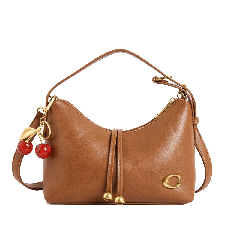 Bolso de mujer de moda de verano bolso de mano popular nicho coreano lujo ligero universal de alta calidad de viaje de hombro mochila