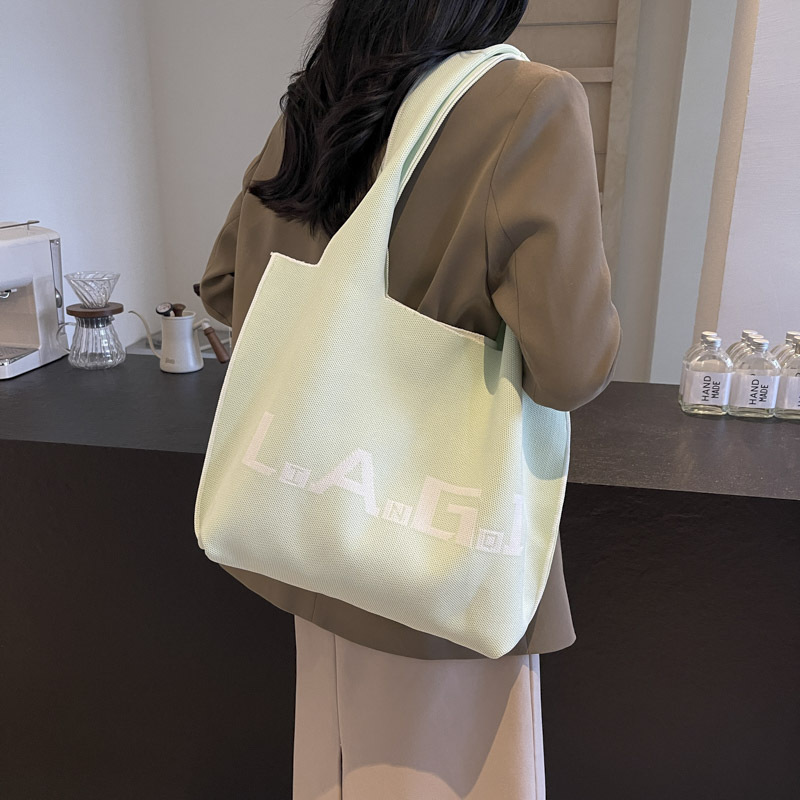 Knitted bag, simple and large-capacity single-shoulder bag, fashionable striped bucket bag for students going out, new tote bag for commuting to work undefined