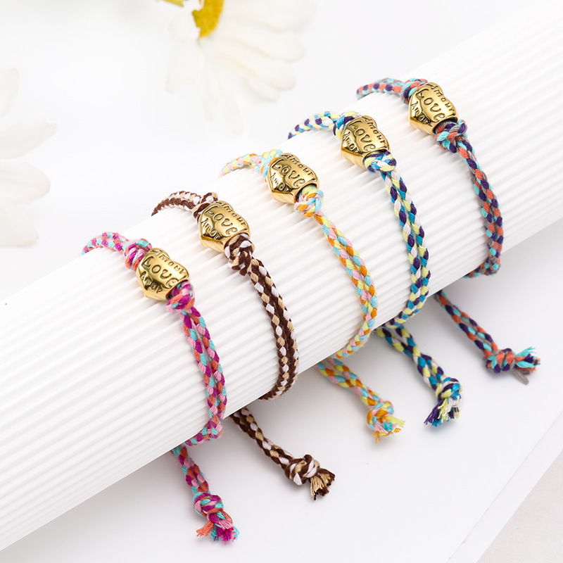 Cross-Border European and American Titanium Steel Bracelet Retro Letters Dopamine Peach Heart Adjustable Hot Selling New Gold Beads Cotton Rope Exquisite Cross-Border European and American Titanium Steel Bracelet Retro Letters Dopamine Peach Heart Adjustable Hot Selling New Gold Beads Cotton Rope Exquisite