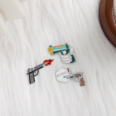 歐美新品創意卡通手槍胸針 合金滴油配飾衣服包包學生禮品