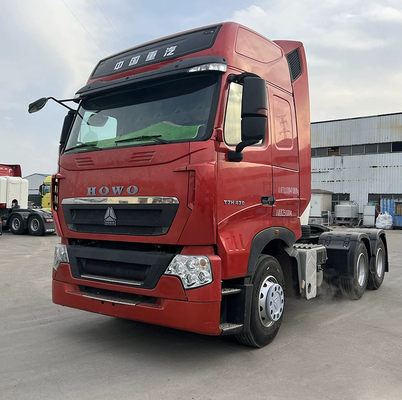 Тягач Sinotruk Howo T7 с задним восьмиколесным грузовым транспортом, 420 л.с.
