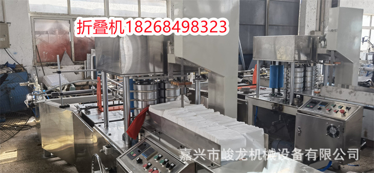 一次性毛巾折叠机包装机 无纺布足浴毛巾折叠切割机 美发毛巾机