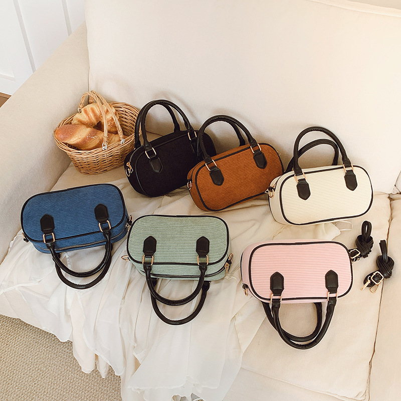 Bolsas de hombro de alto valor de color macarón para hombres y mujeres, bolsas de mano de niños a rayas de moda, bolsas para niños de caimón de otoño y invierno