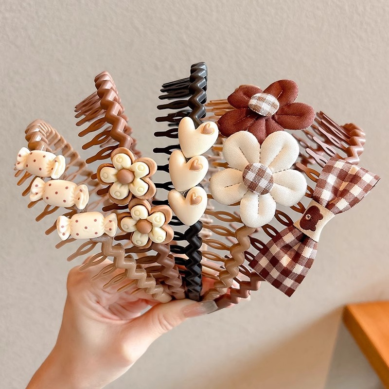 Otoño y invierno leche de café lindas flores peinadas peinadas de cabello para niños dibujos animados cinturón de cabeza de dientes antideslizantes peinadas de cabello para mujeres