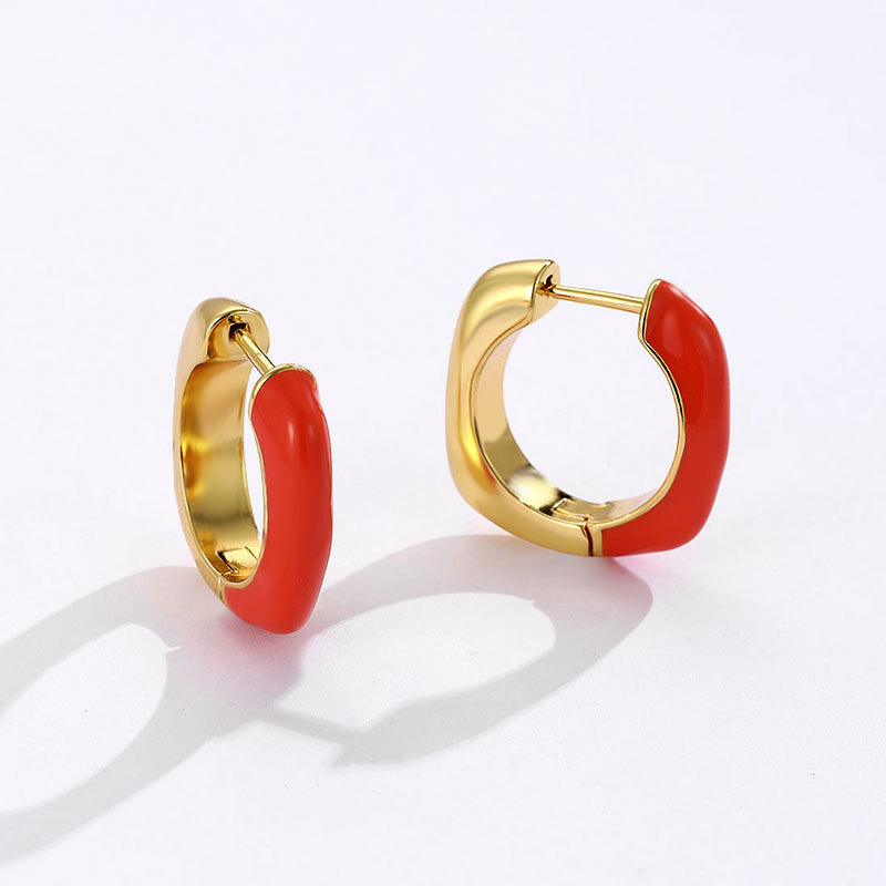 Doudou same style European and American fashion white enamel drop earrings Women's Light luxury niche design high-grade ear buckle earrings