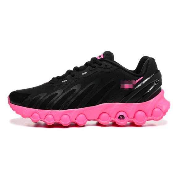 Pink background and black surface