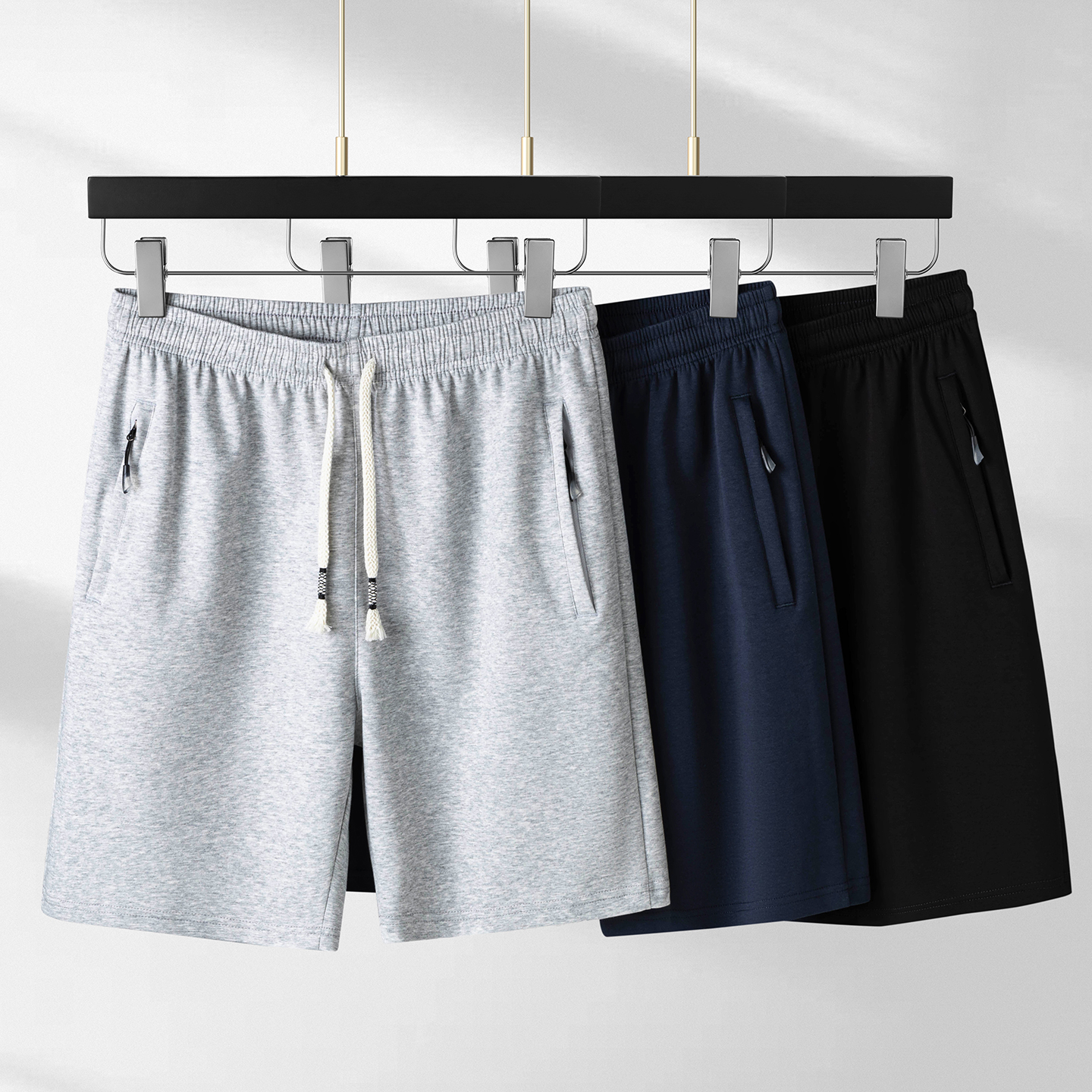 Pantalones casuales de cinco puntos de cordón de gran tamaño de algodón de verano para hombres, pantalones delgados para aumentar el peso de los pantalones cortos deportivos sueltos para hombres gordos