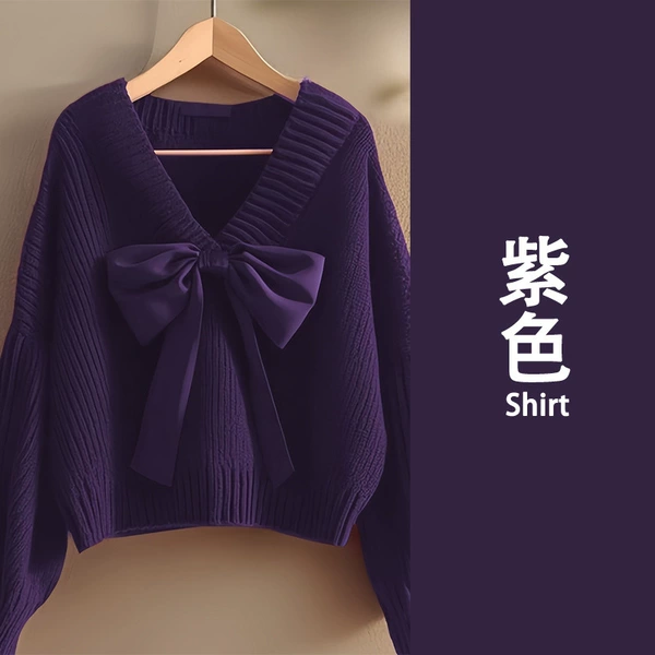 Purple knitted sweater with bow