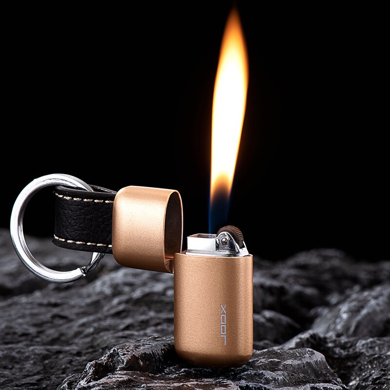 Palm treasure grinding wheel inflatable open fire lighter creative personality portable mini keychain lighter TikTok supply