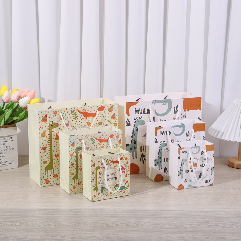 厂家购物纸袋印刷logo企业白卡商务袋子花式服装手提袋制作